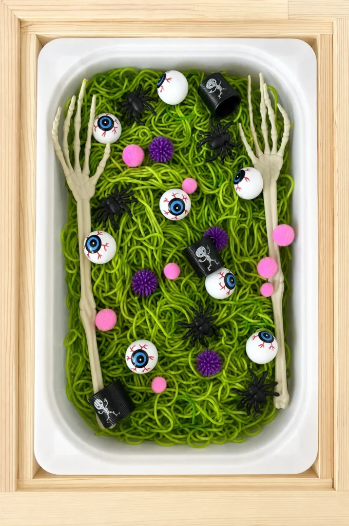 Spooky Green Noodle Halloween Sensory Bin